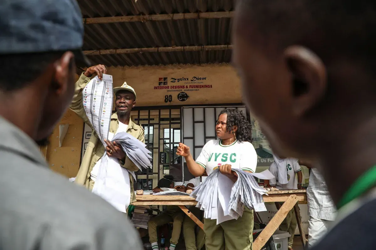 INEC Adhoc staffs counting ballot sheets