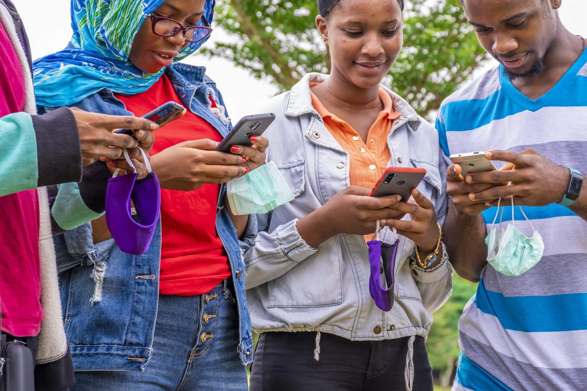 Young Nigerians on their mobile devices